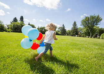 Image showing Girl With Balloons Running In Meadow