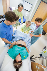 Image showing Man Holding Woman's Hand During Delivery In Hospital