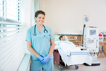 Image showing Nurse With Patient Receiving Renal Dialysis In Hospital