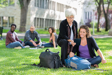 Image showing Female University Students Using Digital Tablet On Campus