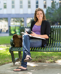 Image showing University Student With Book Studying On Campus