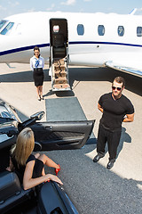 Image showing Woman Stepping Out Of Car At Terminal