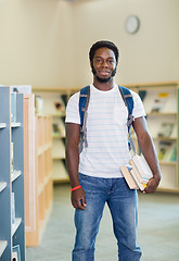 Image showing Student With Books Standing In Bookstore