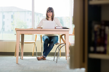Image showing Smiling Student Studying In Library