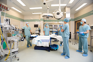 Image showing Medical Team Discussing In Operation Room