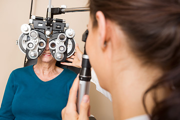 Image showing Optometrist Examining Patient's Vision