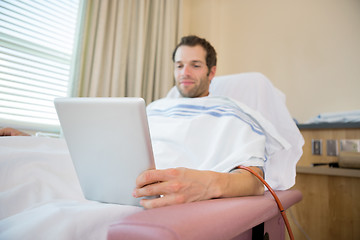 Image showing Patient Using Tablet Computer During Renal Dialysis