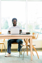 Image showing Student Using Laptop In Library