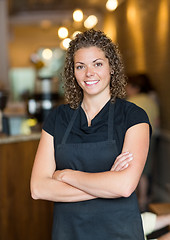 Image showing Waitress Standing Arms Crossed In Espresso Bar