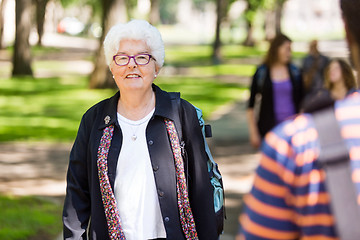 Image showing Senior Female Professor Standing On Campus