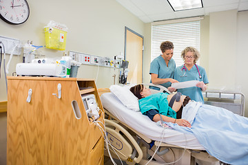 Image showing Nurses Looking at Cardiotocograph Report