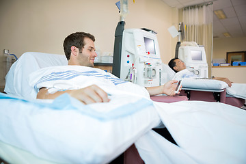 Image showing Patients Sleeping While Receiving Renal Dialysis