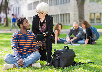 Image showing Professor Helping Student on Digital Tablet
