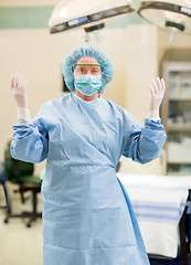 Image showing Female Doctor In Surgical Gown