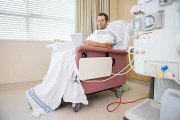 Image showing Patient Holding Digital Tablet