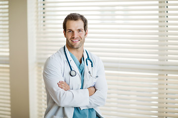 Image showing Confident Cancer Specialist With Arms Crossed At Clinic