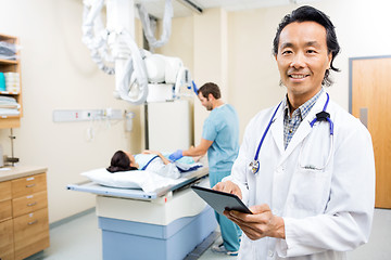 Image showing Doctor Using Digital Tablet In Hospital Room