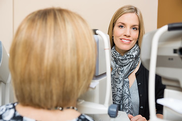 Image showing Optometrist Using Tonometer to Measure Patients Eye Pressure