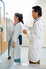 Image showing Doctor Preparing Patient For Chest Xray