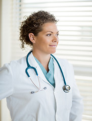 Image showing Thoughtful Doctor Looking Away In Clinic