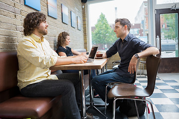 Image showing Friends Spending Leisure Time In Cafe