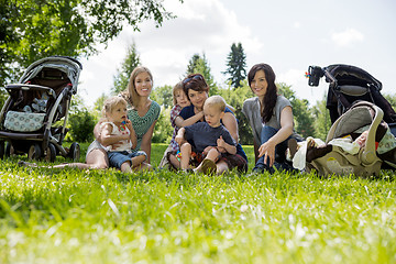 Image showing Women With Their Children Enjoying Picnic