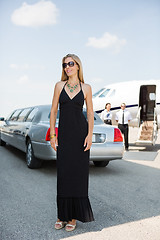 Image showing Woman In Elegant Dress At Airport Terminal