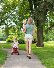 Image showing Woman With Children Strolling In Park