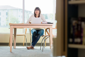 Image showing University Student With Laptop In Library