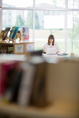 Image showing Student Using Laptop In Library