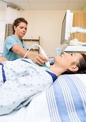 Image showing Nurse Performing Ultrasound Neck Scan