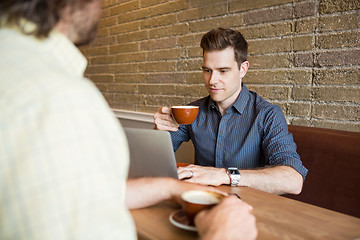 Image showing Man and Friend in Coffee Shop Using Computer