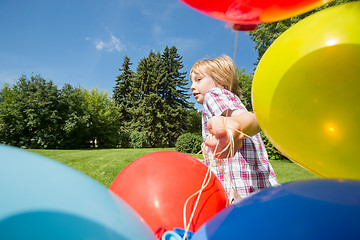 Image showing Boy With Balloons Running In Park