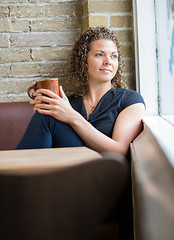 Image showing Woman With Coffee Mug In Cafeteria