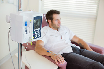 Image showing IV Drip Attached To Patient's Hand During Chemotherapy