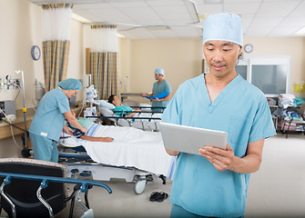 Image showing Nurse Using Digital Tablet In Ward