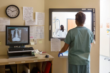 Image showing Nurse Operating Machine In Xray Room