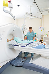 Image showing Nurse Preparing Patient For CT Scan