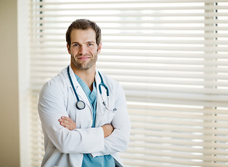 Image showing Young Male Doctor Standing Arms Crossed