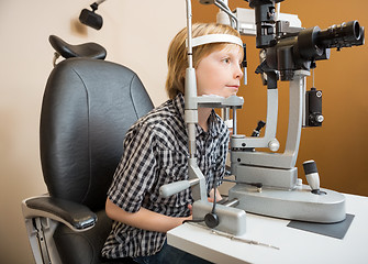 Image showing Boy Undergoing Eye Examination With Slit Lamp