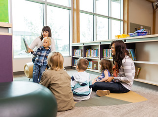 Image showing Teachers And Students In Library