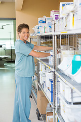 Image showing Female Nurse Working In Storage Room