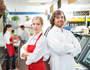 Image showing Portrait Of Confident Butchers With Arms Crossed