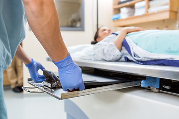 Image showing Nurse Preparing For Xray In Examination Room