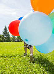 Image showing Boy With Colorful Balloons In Park