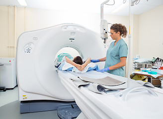 Image showing Nurse Preparing Patient For CT Scan