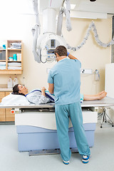 Image showing Nurse Preparing Xray For Patient