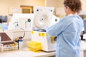 Image showing Scientist Using PCR Machine In Laboratory