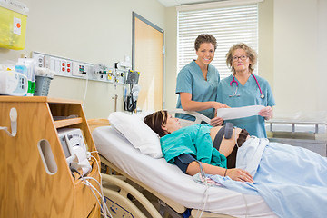 Image showing Nurses in Maternity Ward Looking at Camera