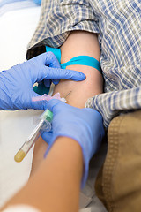 Image showing Doctor Drawing Blood For Test